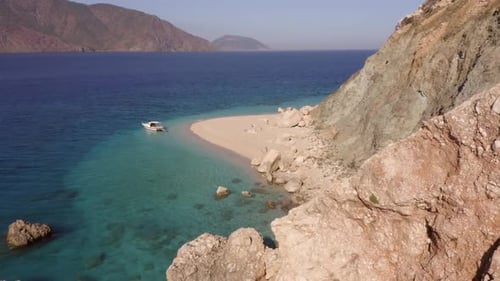 Picturesque Seascape View of Clear Blue Ocean Rocky Cliffs and Mountains