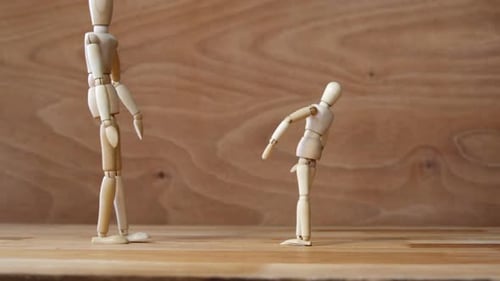 Wooden Mannequins Standing Still in a Mid Shot