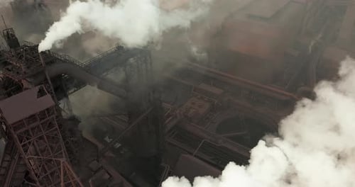 Air Pollution. Clouds of Smoke Coming From the Chimneys of the Plant. Drone Flying Over Smoking