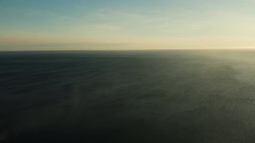 Cloudy Sky Over the Sea During Sunset