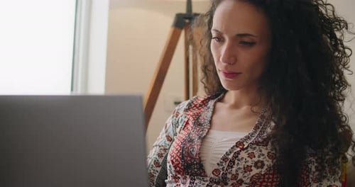 Woman Working on Laptop Indoors, Close Up Shot