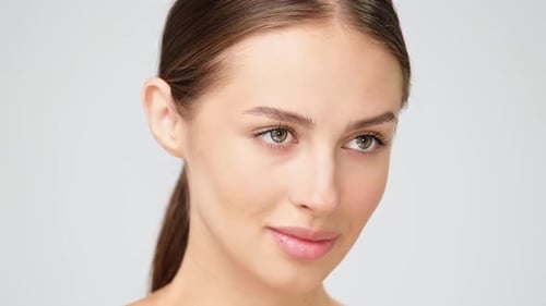Woman Smiling in Studio, Close Up Portrait