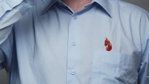 Sauce Stains Light Blue Shirt in Close-Up Shot