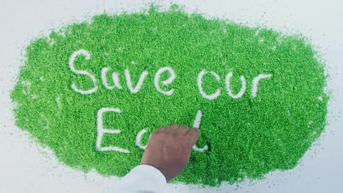 Green Hand Writing Save Our Earth