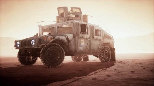 Military Patrol Car on Sunset in Desert Storm