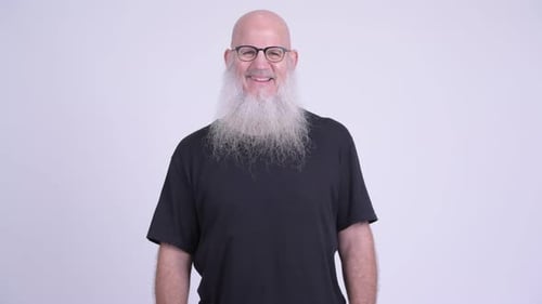 Mature Man with a Long White Beard Smiles