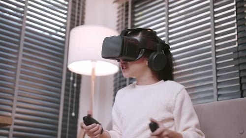 Girl Wearing VR Headset Playing Video Game