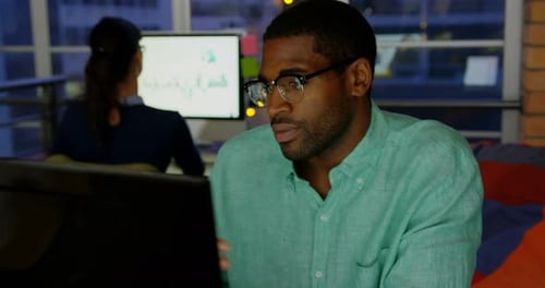 Businessman making video call on computer in a modern office 4k