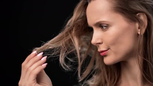 Closeup Shocked Lady with Perfect Skin Having Health Hair Trouble Isolated