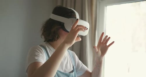 Woman Experiencing Virtual Reality in Bright Home