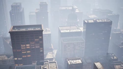 Abstract Aerial Flyover Through a Misty Urban Cityscape