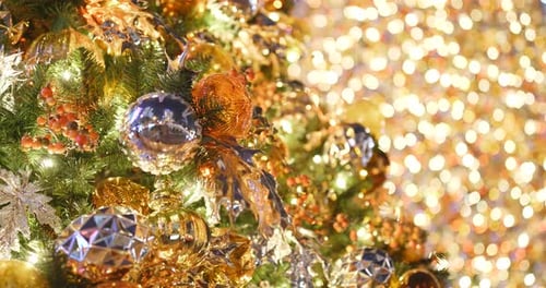Decorated Christmas Tree with Elegant Gold and Silver Ornaments