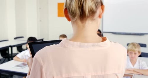 Enthusiastic Children Answer Teacher's Question in Classroom