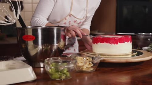 Close Up Shot of the Kitchen Table, the Chef Prepares the Cake with Food Colors
