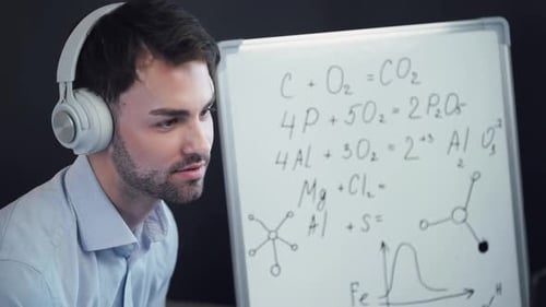 Tutor Explaining Chemistry Online with Whiteboard and Headphones