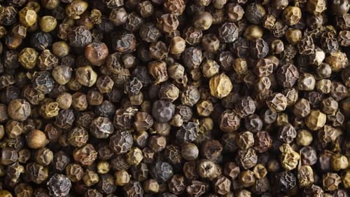 Close Up of Pile of Black Peppercorns