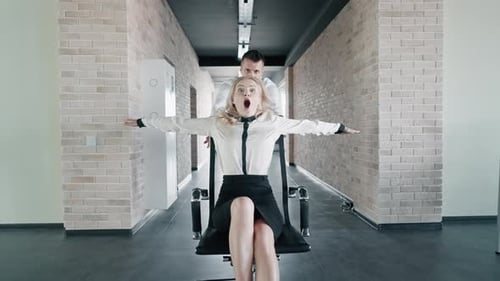 Woman Enjoying a Ride in Office Chair