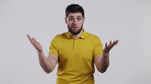 Man Reacting With Surprise, Confusion, and Open Gestures