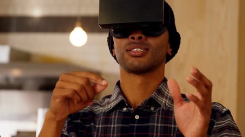 Young Adult Man Using Virtual Reality Headset