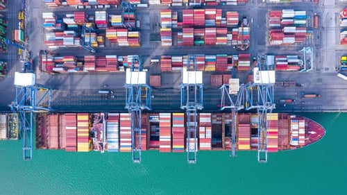 Timelapse of international Containers Cargo ship loading unloading at port, Freight Transportation,