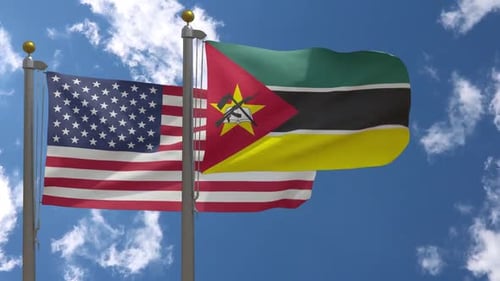 United States and Mozambique National Flags Waving