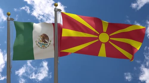Flags of Mexico and North Macedonia Waving in Blue Sky