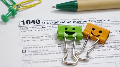 Close Up Of A 1040 Tax Form On A Desk