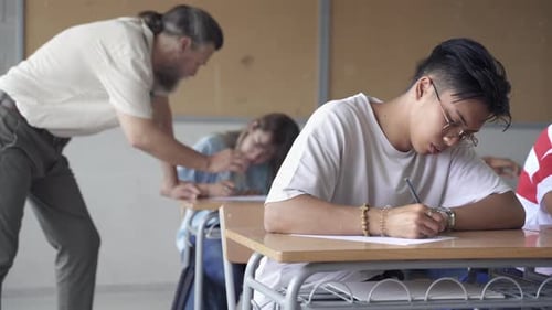 Asian Teenager Student Taking Exam