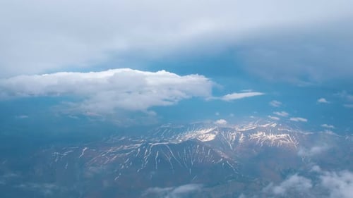 Mountain Range Seen From Airplane Window