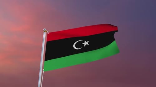 Realistic Libya Flag Waving in the Wind at Sunset