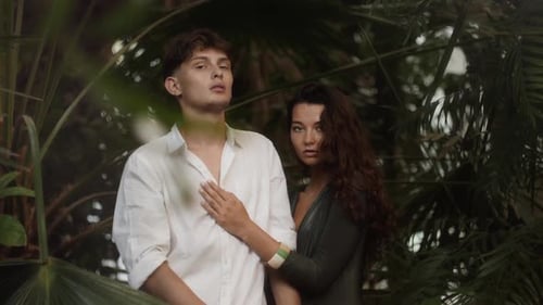 Stylish Couple Posing in Tropical Paradise