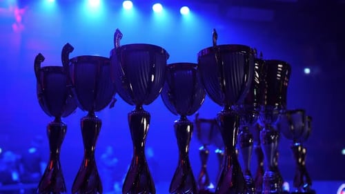 Cups for Presentation on the Background of Stage Lighting