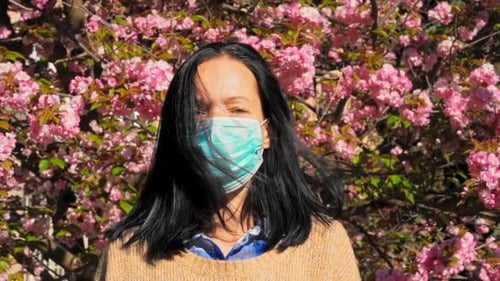 Portrait Female in Face Guard in Park