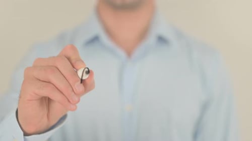 Man Writes Apprentice on Clear Surface