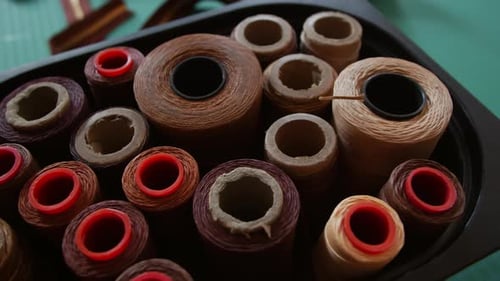 Spools of Thread in Tannery