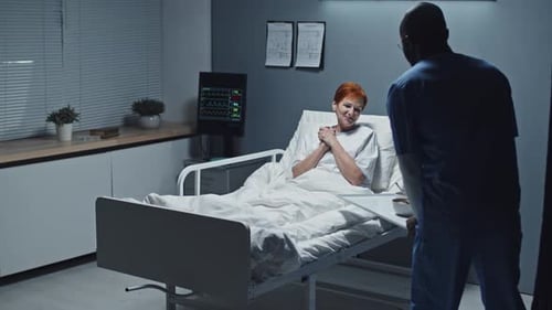 Healthcare Worker Brings Patient Food in Hospital