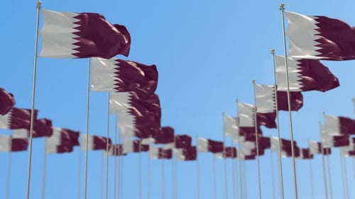 Realistic Waving Qatar Flags with Clear Blue Sky