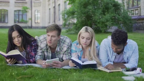 Group of Students Engaging in Self-Development, Lying in University Garden