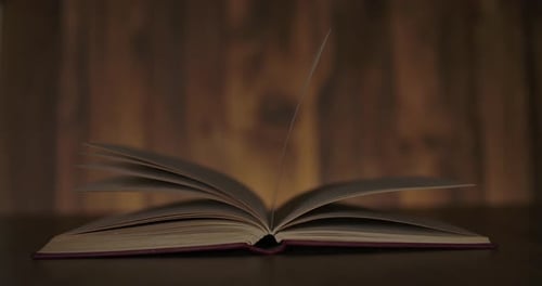 Pages Turning in an Open Book Close Up