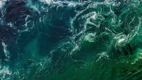 Waves of Water of the River and the Sea Meet Each Other During High Tide and Low Tide.
