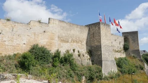 CAEN, FRANCE - AUGUST 2015 Famous William the Conqueror castle fortification and ramparts by the d