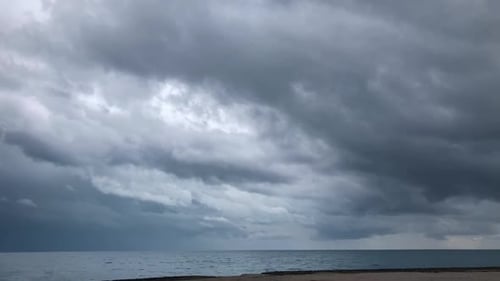 Heavy Rain Clouds Above Sea Timelapse