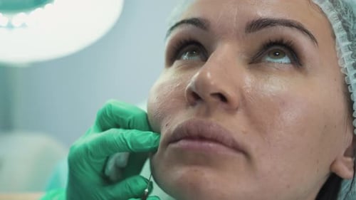 Doctor Injects Anti-aging Filling To Woman in Beauty Clinic
