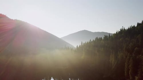 Mountain Peaks and Morning Sky with Smooth Moving Clouds