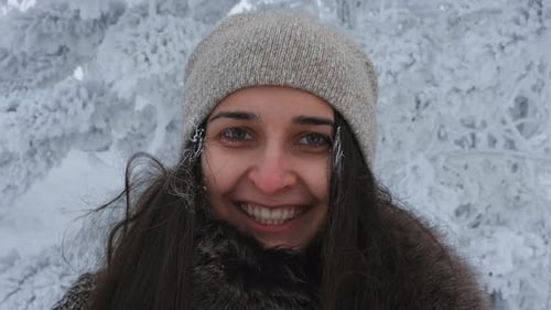 Portrait of a Young Charming Woman in the Cold