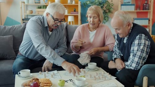 Seniors Relaxing and Playing Bingo Together