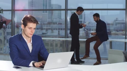 Young Adults Working in Modern Office