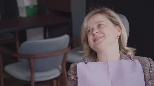 Woman at Dentist Office Patient in Chair