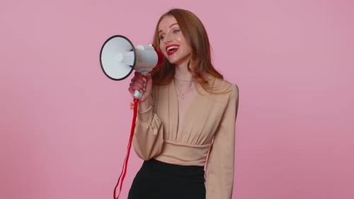 Woman Speaking Into Megaphone With Enthusiasm