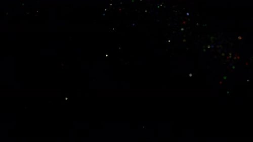Festive Glitter Particles on Black Background Animation